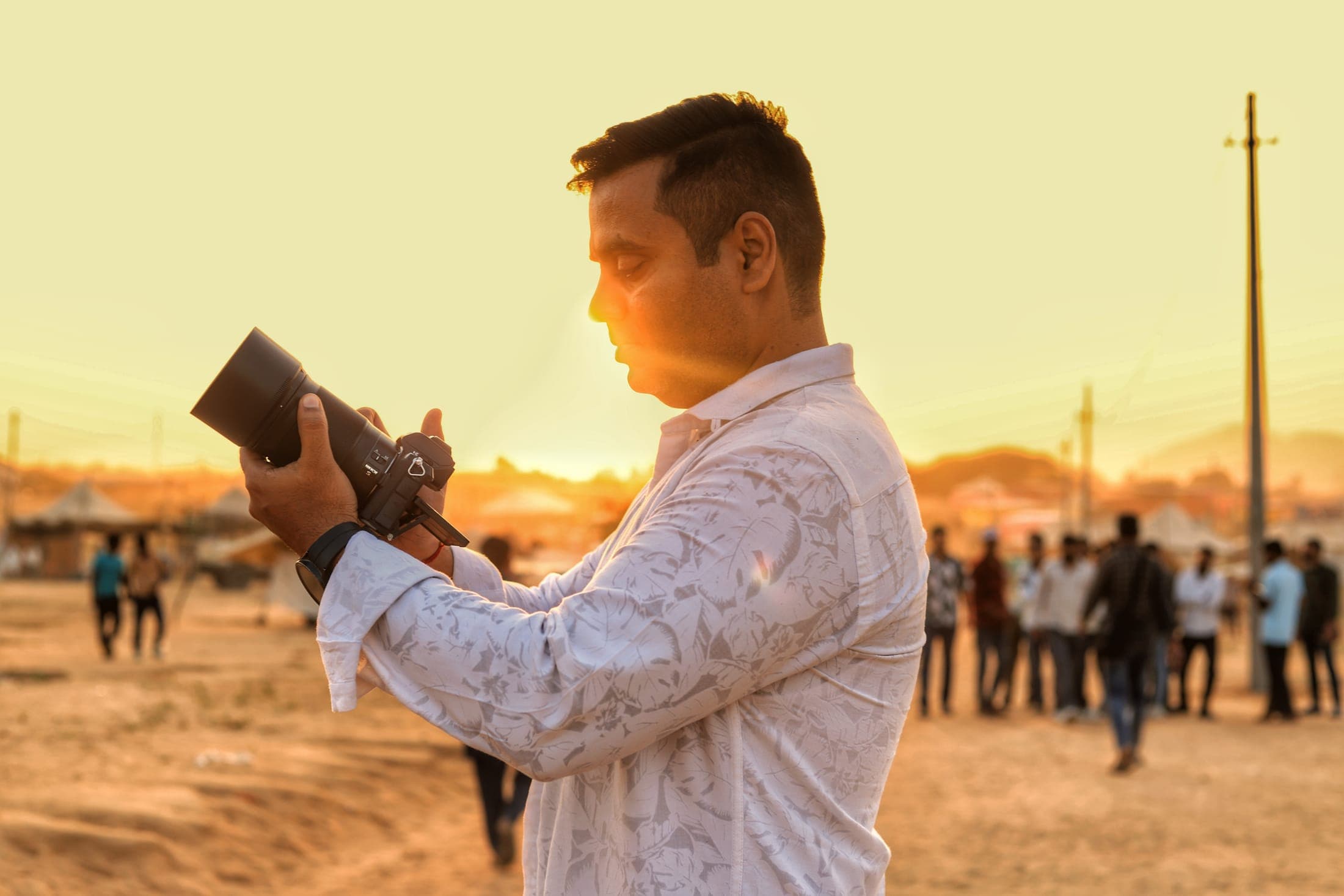 Akshat at the fair, golden hour — Pushkar
